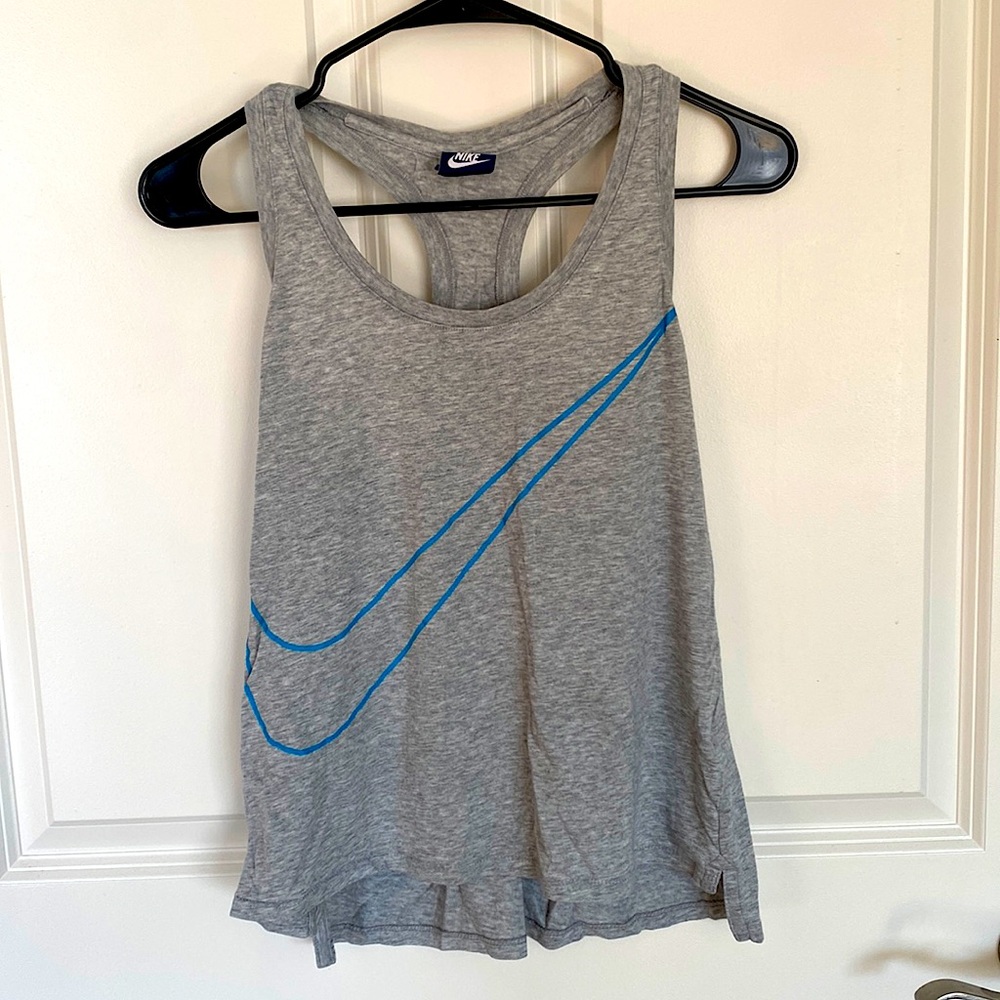 Grey Nike tank top with blue check mark